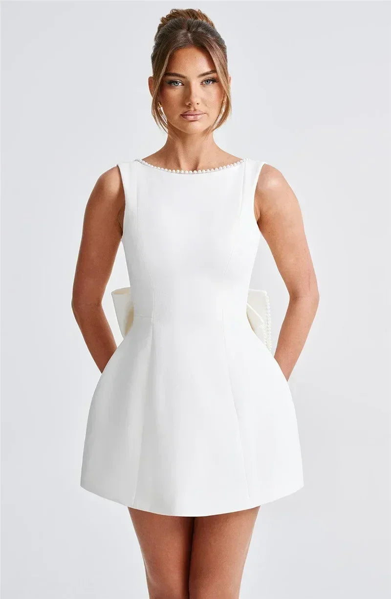Mozision Pearl Bow Backless Sexy Mini Dress For Women Robe Fashion Zipper Sleeveless High Waist A-line Club Party Dress Elegant